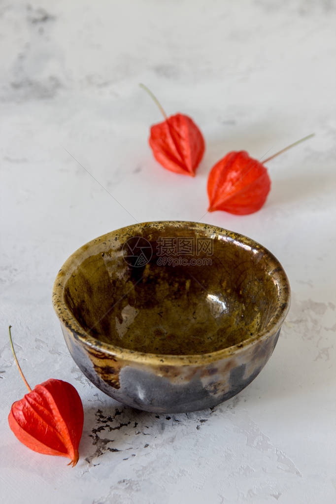 手工制造的陶瓷碗手工制作的金图片