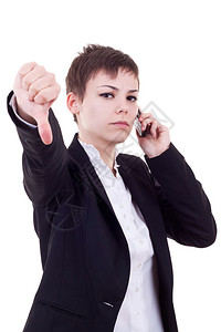大拇指向下手势和手机的女商人图片