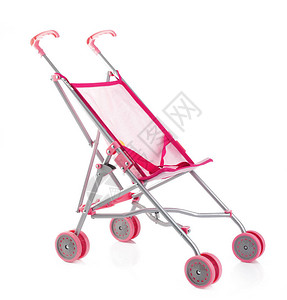 小粉红色的婴儿车或娃漫步车图片