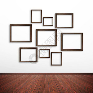 房间内白墙上的木制相框图片