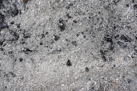 灰烬和煤小颗粒和切片背景图片