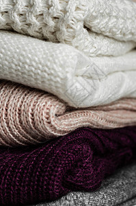 温暖的针织毛衣温暖背景下的针织服装毛衣针织品空图片