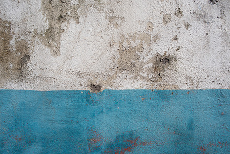 街道老化的水泥旧破坏生锈粗糙的垃圾白色和蓝色图片
