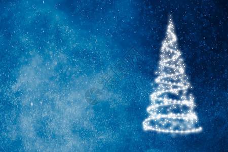 蓝色闪亮背景上的抽象圣诞树背景图片