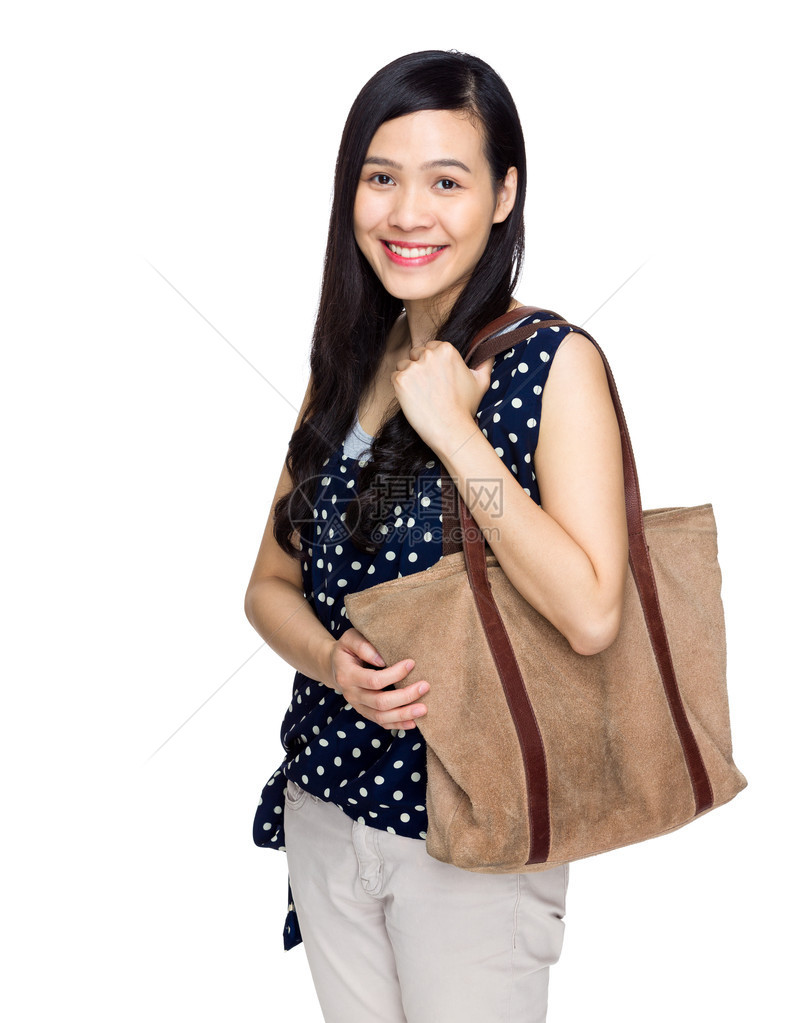 手提包的女人图片
