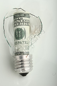 破碎的灯泡与美元图片