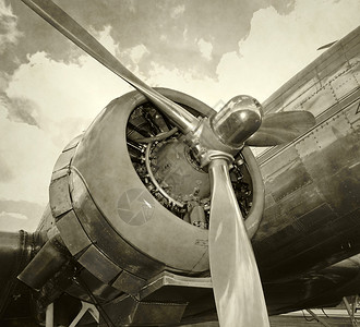 复古飞机的发动机和螺旋桨特写背景图片