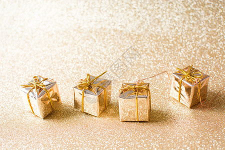 金色礼品盒有金亮闪背景背景图片