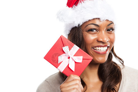 一个黑人女庆祝圣诞节拿着礼物背景图片