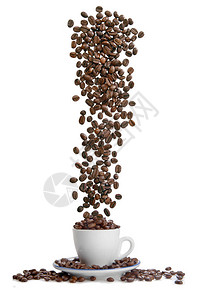 咖啡杯中咖啡豆的瀑布图片