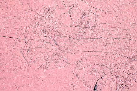 墙上的粉红色油漆开裂和剥落老式木背景与剥落的油漆带背景图片