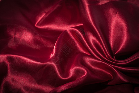 红色丝绸纺织背景图片