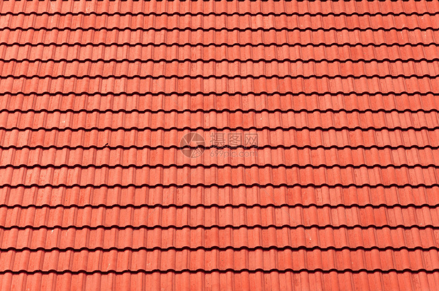 背景的红瓦屋顶图片