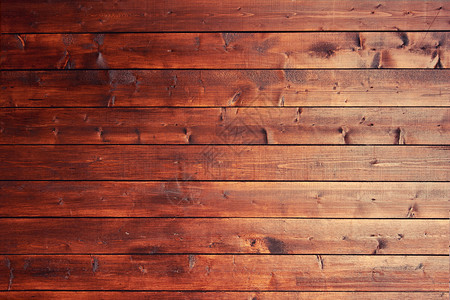 一个可怕的打结的木制旧板的纹理图片