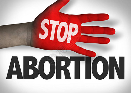 停止在红手上的堕胎题词背景图片