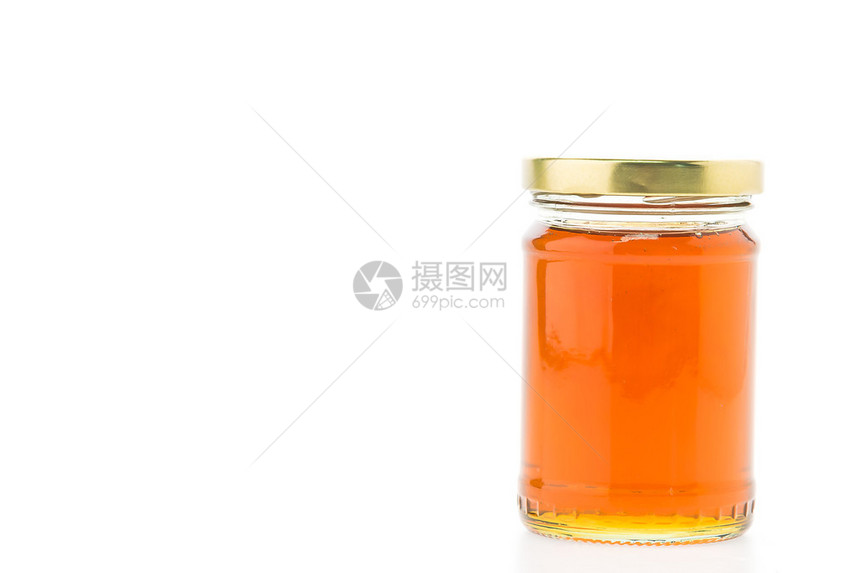 孤立在白色背景上的橙色果酱罐玻璃图片