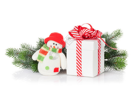 圣诞礼品盒雪人玩具和fir树图片