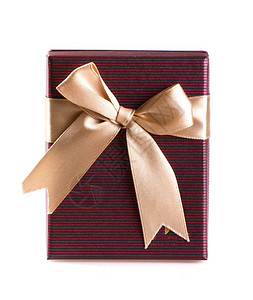 带金丝带和蝴蝶结的礼物盒图片