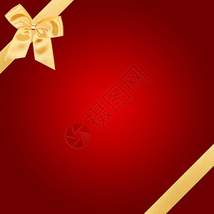 方形红卡上的金色圣诞蝴蝶结背景图片