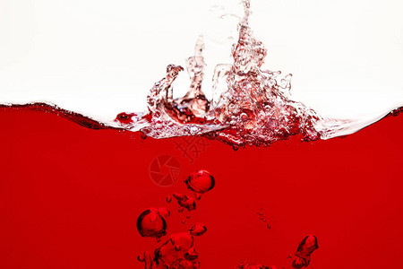 红色亮液体有喷洒和水下泡图片
