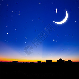 月亮和星在小镇上空的日落图片
