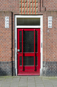 荷兰阿姆斯特丹公寓楼外的门背景图片