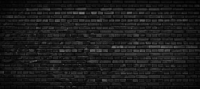 黑砖墙全景纹理垃圾背景的砖面图片