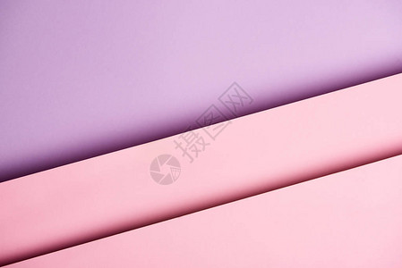 紫色和粉红色调的重叠纸张图案背景图片