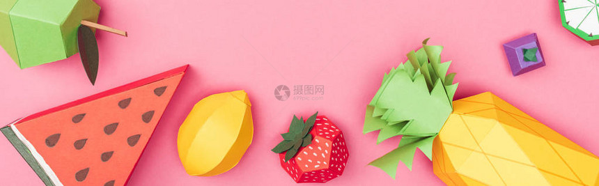 多色手工造纸水果被粉红色隔图片