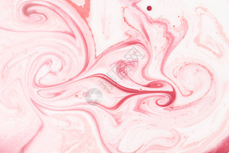 用粉红色油漆关闭抽象浅色背景图片