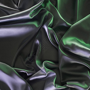 绿色和银色闪亮的丝绸面料背景图片