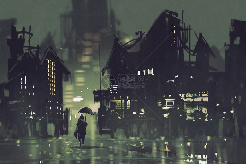 有雨伞的男人晚上在黑暗的城市里走着图片