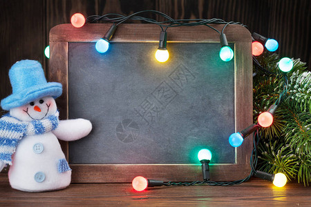 圣诞黑白板雪人fir树和灯光您可以使用复制背景图片