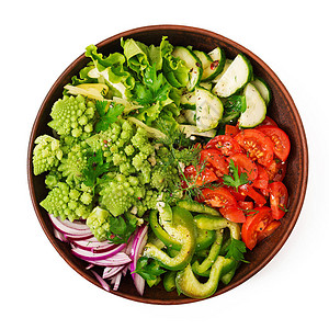 新鲜蔬菜和卷心菜的Vegan沙拉在白图片