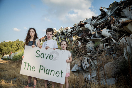 拯救地球年轻孩子持有保护地球的标志图片