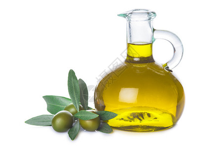 白色背景中带叶子和橄榄的橄榄油瓶图片