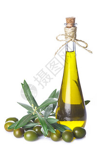 白底隔离的含叶子和橄榄的橄榄油瓶和木图片
