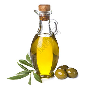 额外的橄榄油瓶和绿色橄榄白种树叶与图片