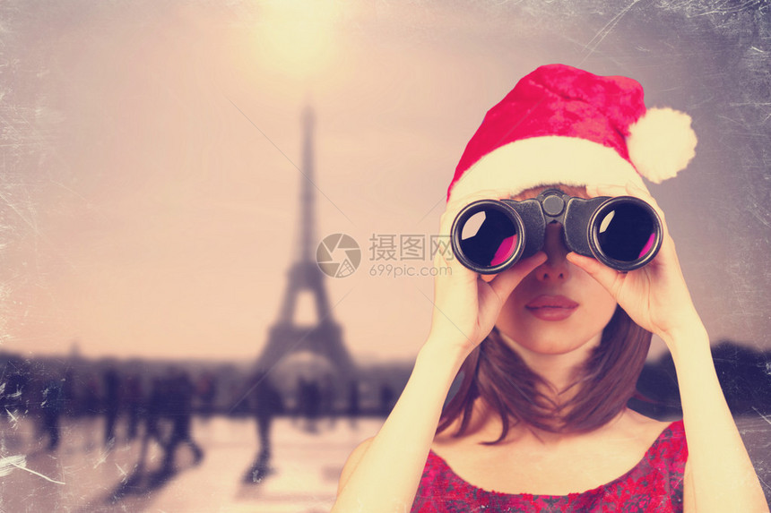 有望远镜和圣诞节帽和法国的女孩图片
