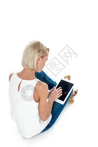 金发女人背面的画面使用数字平板电脑空白屏背景图片