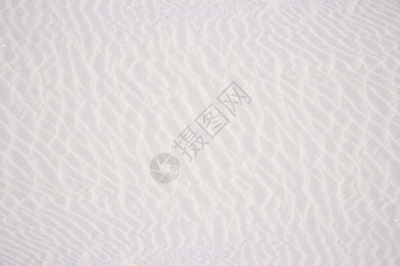 夏季海滩沙纹的特写背景图片