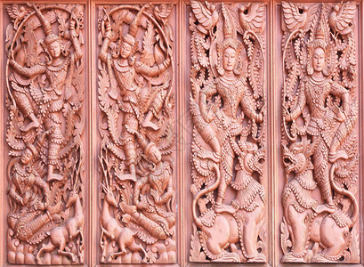 雕刻佛教寺庙墙的木头图片
