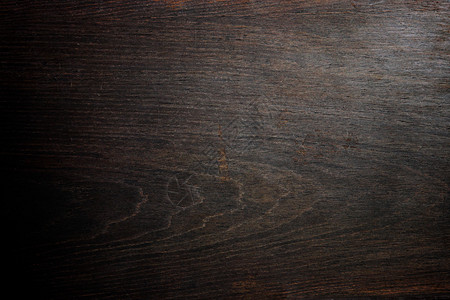 深棕色的旧木材纹理为背景背景图片