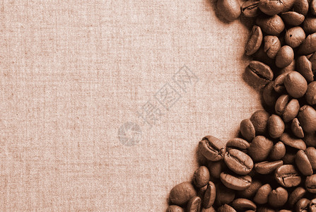 关闭一些咖啡豆的照片背景图片