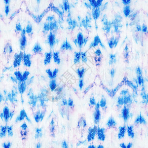 白色丝绸上美丽的无缝蓝色扎染图案蜡染手绘面料结节蜡染Shi图片