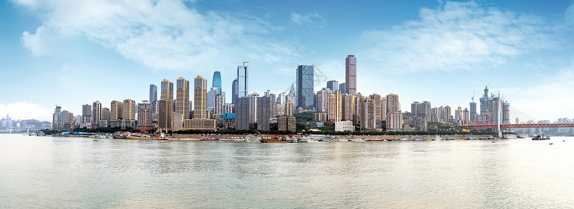 蓝天下重庆近水市区风景背景图片