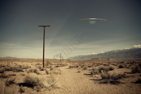 低空飞行的UFO号飞船在一条沙漠土路上徘徊晴天高清图片素材