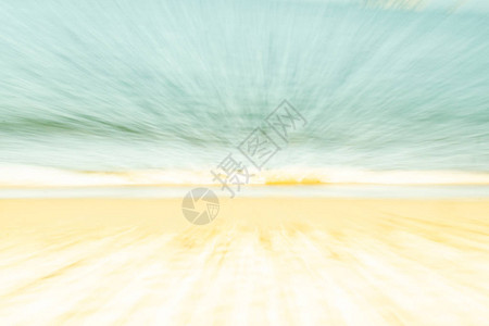 柔软的海衣背景沿海抽象的金沙蓝水金色天空图片
