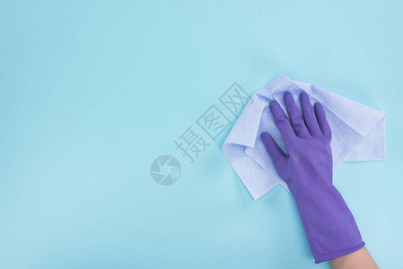 紫色橡胶手套蓝色背景布抹的更清图片