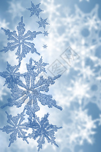蓝色雪花抽象背景图片